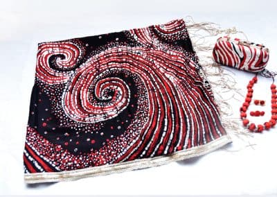 Hand-dyed batik shawls, clutches and jewellery by Suraliya Batik