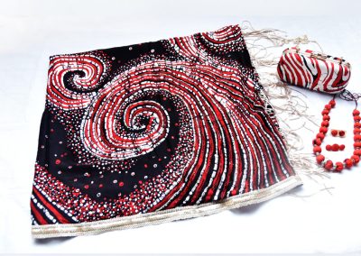Hand-dyed batik shawls, clutches and jewellery by Suraliya Batik